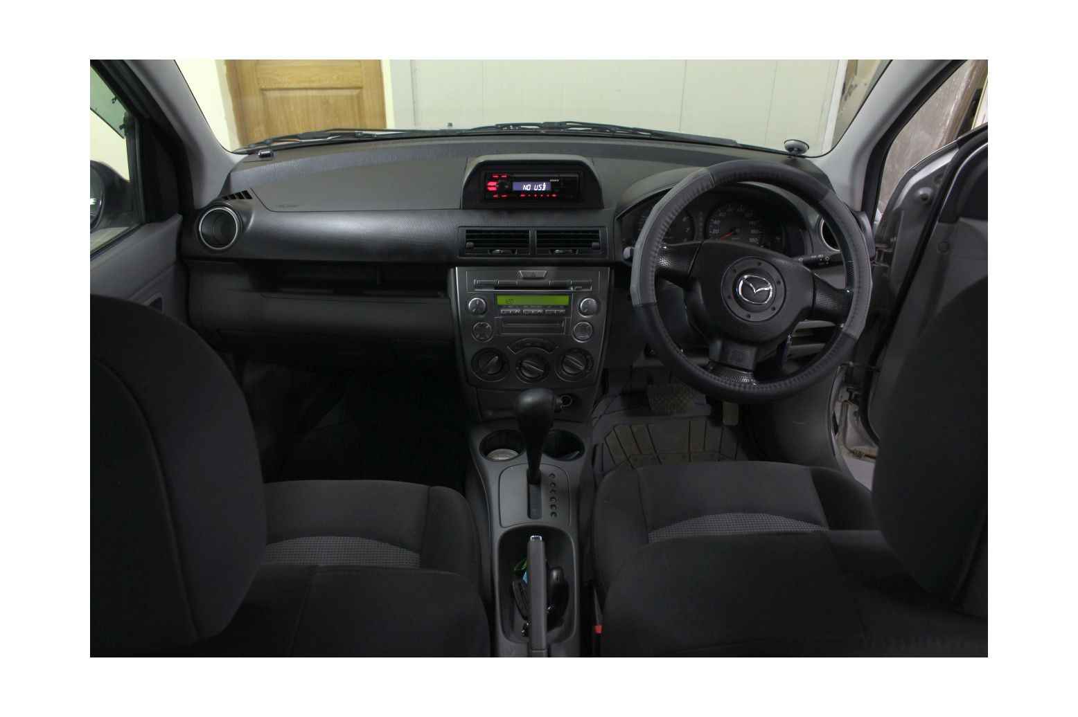 Переходная рамка для Mazda Demio, Mazda 2 02-07 1DIN черная